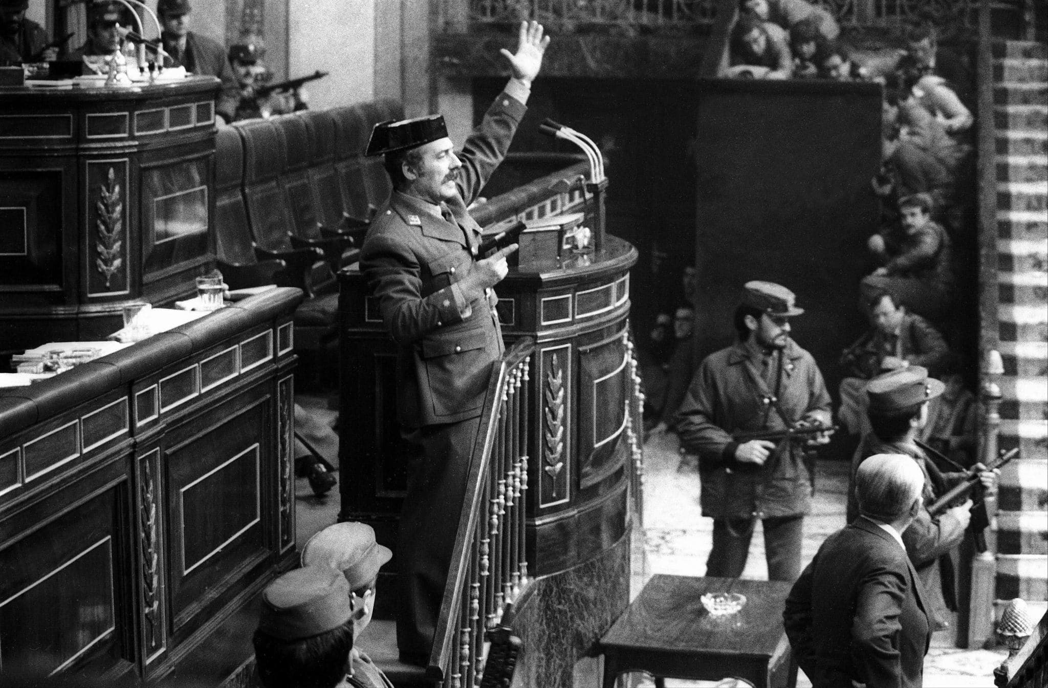 MAD01-20010222-MADRID, SPAIN: (FILES) A file picture dated 23 February 1981 shows the lieutenant colonel Antonio Tejero (C) holds a hand gun, in the Congress during the second voting of Leopolgo Calvo Sotelo as president of the government. Tomorrow, Friday 23 February 2001, will commemorate the 20th aniversary of the attempted coup in Spain. At the time this picture was awarded the World Press Photo award.   ANSA-CD     EPA PHOTO   EFE FILES/MANUEL PEREZ BARRIOPEDRO