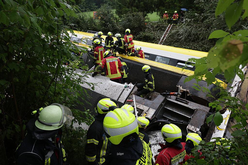 27 July 2025, Baden-WÃ¼rttemberg, Riedlingen: Rescue workers search for passengers in a derailed train. The passenger train derailed in the Biberach district between the districts of Zweifaltendorf and Zell. Photo: Thomas Warnack/dpa (Photo by Thomas Warnack/picture alliance via Getty Images)