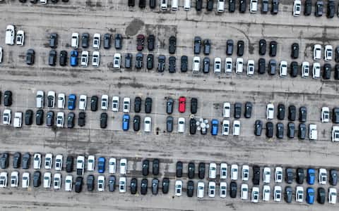 epa10362594 An aerial image made with a drone shows the Stellantis Jeep vehicles awaiting shipment to dealers at the assembly plant in Belvidere, Illinois, USA, 12 December 2022. According to the company, the plant will be idled on 28 February 2023 and about 1350 employees will be indefinitely laid off. Stellantis is moving the vehicle production to Mexico and blames the closing of the Illinois plant on the cost of producing electric vehicles. Automobiles were first produced at the plant on 07 July 1965.  EPA/TANNEN MAURY