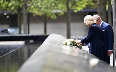 NEW YORK, NEW YORK - APRIL 29: Michael Bloomberg, King Charles III and Queen Camilla are seen after laying a bouquet of flowers on the edge of one of the memorial’s pool during a ceremony at the National September 11 Memorial on day three of the State Visit of King Charles III and Queen Camilla to the United States of America, on April 29, 2026 in New York City. In his first visit to the U.S. as the British monarch, King Charles III toured the nation's capital where he met with U.S. President Trump at the White House and addressed a joint meeting of Congress before traveling to New York City as part of a multi-day trip to mark the United States of America's 250th anniversary of its independence. (Photo by Samir Hussein/Samir Hussein/WireImage)