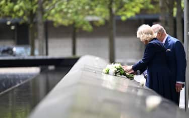 NEW YORK, NEW YORK - APRIL 29: Michael Bloomberg, King Charles III and Queen Camilla are seen after laying a bouquet of flowers on the edge of one of the memorial’s pool during a ceremony at the National September 11 Memorial on day three of the State Visit of King Charles III and Queen Camilla to the United States of America, on April 29, 2026 in New York City. In his first visit to the U.S. as the British monarch, King Charles III toured the nation's capital where he met with U.S. President Trump at the White House and addressed a joint meeting of Congress before traveling to New York City as part of a multi-day trip to mark the United States of America's 250th anniversary of its independence. (Photo by Samir Hussein/Samir Hussein/WireImage)