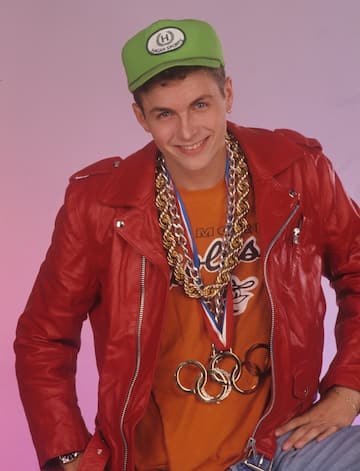 Portrait of Italian songer-songwriter and rapper Jovanotti (Lorenzo Cherubini) wearing a red leather jacket and a Hagan Sports cap on his head. 1988  (Photo by Angelo Deligio\Mondadori via Getty Images)