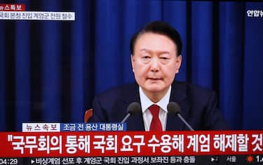 epa11755809 South Korean President Yoon Suk Yeol announces his intention to lift the emergency martial law via a Cabinet meeting in a televised address at the presidential office in Seoul, South Korea, 04 December 2024. The announcement came hours after the National Assembly unanimously voted in favor of a resolution urging the president to withdraw the martial law during an emergency plenary session. Yoon had declared martial law the previous night, citing the need to root out pro-North Korean forces and uphold the constitutional order.  EPA/YONHAP SOUTH KOREA OUT