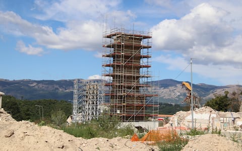 I cantieri nella cittadina di Amatrice, rasa al suolo dal terremoto del 24 agosto 2016, 23 Agosto 2022. ANSA/BASILETTI