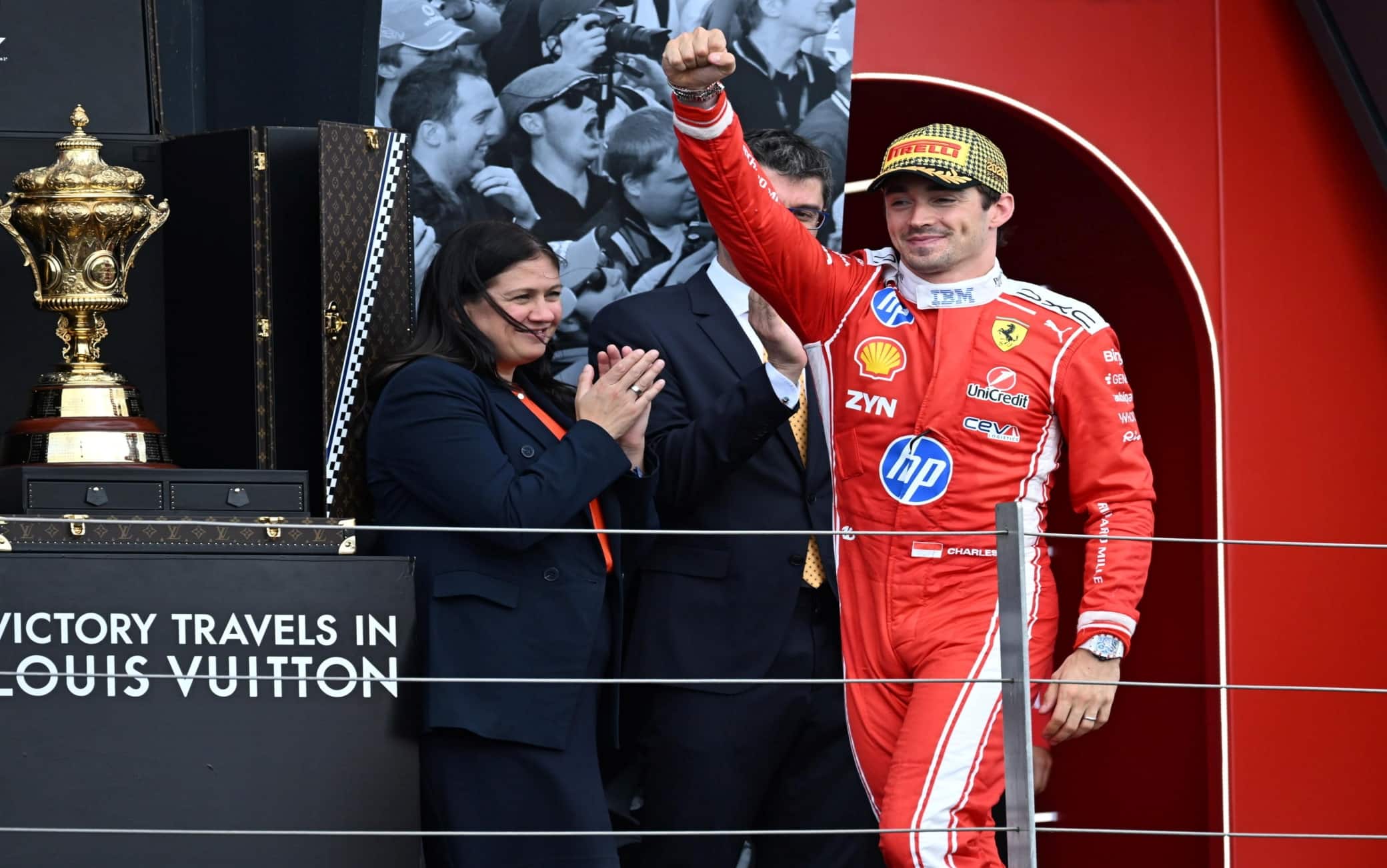 epa13089240 First-placed Scuderia Ferrari driver Charles Leclerc of Monaco celebrates on the podium after the Formula One British Grand Prix at the Silverstone Circuit racetrack in Silverstone, Britain, 05 July 2026.  EPA/PETER POWELL