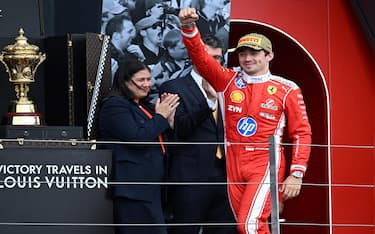 epa13089240 First-placed Scuderia Ferrari driver Charles Leclerc of Monaco celebrates on the podium after the Formula One British Grand Prix at the Silverstone Circuit racetrack in Silverstone, Britain, 05 July 2026.  EPA/PETER POWELL