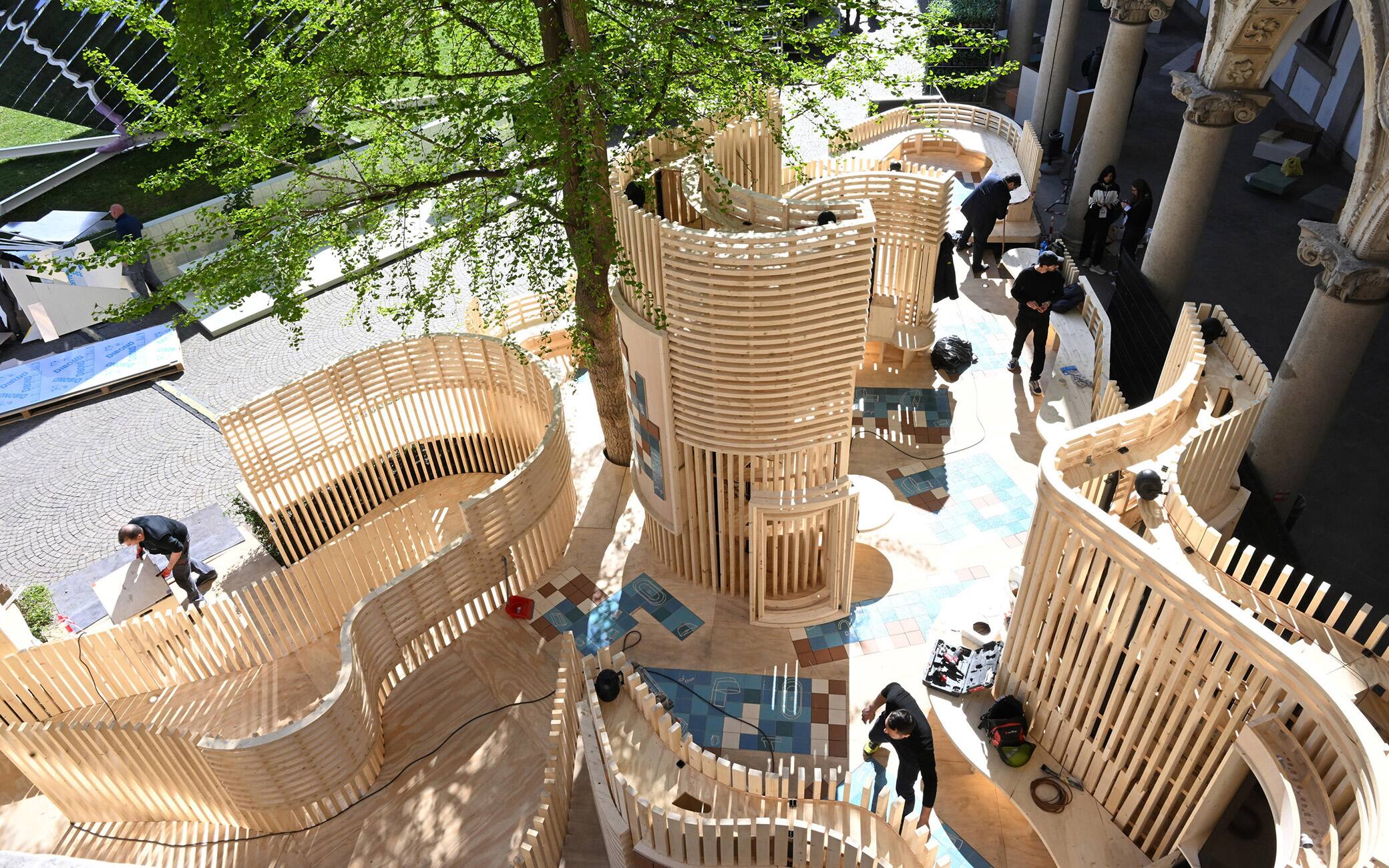 Workers set up one of the installations of the Fuorisalone 2023 Design Week at the State University of Milan,, Italy, 15 April 2023. The Fuorisalone runs from 18 to 23 April. ANSA/DANIEL DAL ZENNARO