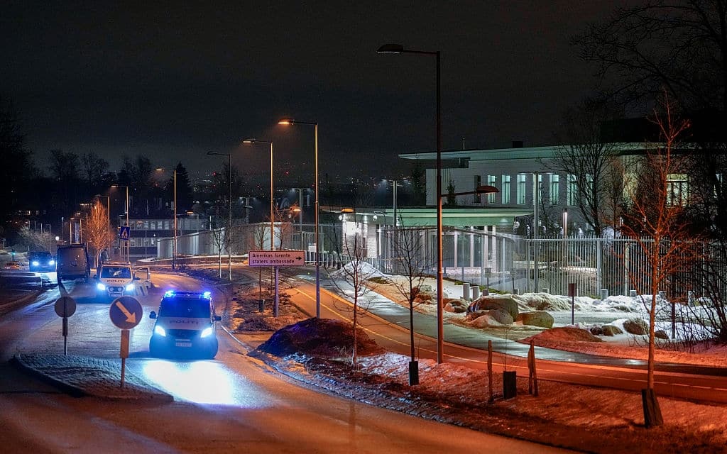 TOPSHOT - Large police resources are in place at the US embassy on Sunday night after a loud bang was reported at the site. No injuries were reported in Oslo on March 8, 2026. (Photo by Javad Parsa / NTB / AFP via Getty Images) / Norway OUT