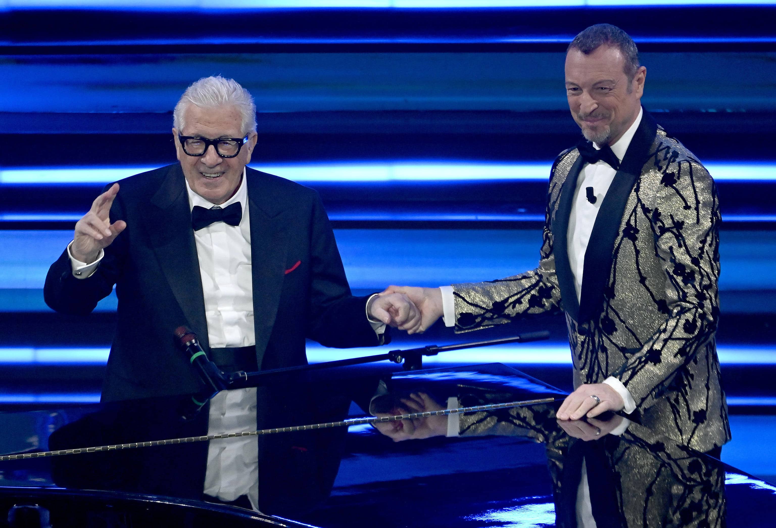 Sanremo Festival host and artistic director Amadeus (R) with Italian singer o Peppino Di Capri on stage at the Ariston theatre during the 73rd Sanremo Italian Song Festival, in Sanremo, Italy, 10 February 2023. The music festival will run from 07 to 11 February 2023.   ANSA/RICCARDO ANTIMIANI