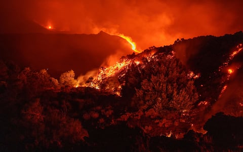The leading edge of Etna s lava flow, descended to an elevation of about 1,300 meters on the sea level, where it encountered vegetation and set some areas ablaze. Catania, 13 August 2026. ANSA/EMILIO MESSINA