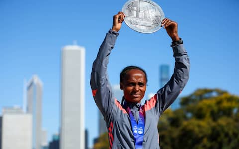 CHICAGO, ILLINOIS - OCTOBER 11: Chicago Marathon women’s champion Hawi Feysa Gejia stands for a portrait in front of the Chicago skyline on October 11, 2026 in Chicago, Illinois. (Photo by Isaac Wasserman/Getty Images)
