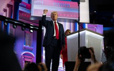 Former US President Donald J Trump speaks at the Republican National Convention in Milwaukee, Wisconsin at the Fiserv Forum on Thursday, July 18, 2024. Monday night was Trump’s first appearance since a rally in Pennsylvania, where he sustained injuries from an alleged bullet grazing his ear. Trump recounted the story in his speech, and also talked about Biden, immigration, and other topics. 
Credit: Annabelle Gordon / CNP/Sipa USA
