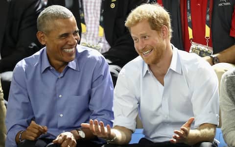 TORONTO, ON - SEPTEMBER 29:  Former U.S. President Barack Obama and Prince Harry share a joke as they watch wheelchair baskeball on day 7 of the Invictus Games 2017 on September 29, 2017 in Toronto, Canada  (Photo by Chris Jackson/Getty Images for the Invictus Games Foundation)