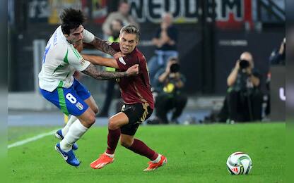 Italy's Sandro Tonali (L) vies for the ball with Belgium's Leandro Trossard during the UEFA Nations League group A2 soccer match between Italy and Belgium at the Olimpico Stadium in Rome, Italy, 10 October 2024.  ANSA/ETTORE FERRARI



