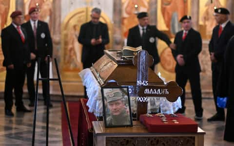 This photograph shows the coffin of late Bosnian Serb military leader Ratko Mladic during  a public memorial on the day of his funeral ceremony for  at St Lukas church in Belgrade, on September 7, 2026. Mladic, 84, died last week after suffering several strokes while serving a life sentence in The Hague for war crimes committed during the 1990s war in Bosnia. (Photo by OLIVER BUNIC / AFP)