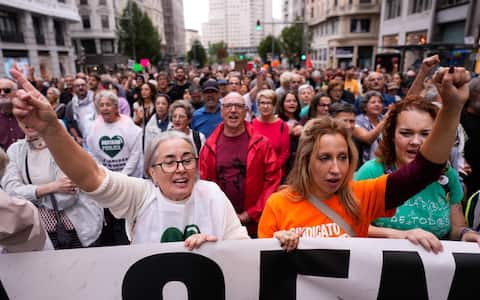 epa13278372 Protesters participate in a demonstration calling for the authorities to address the ongoing housing problems, in Madrid, Spain, 03 October 2026, a day after housing decrees introduced by the Spanish government to tackle