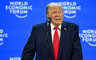 US President Donald Trump delivers a special address during the World Economic Forum (WEF) annual meeting in Davos on January 21, 2026. The World Economic Forum takes place in Davos from January 19 to January 23, 2026. (Photo by Fabrice COFFRINI / AFP)