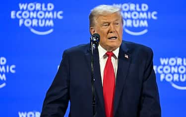 US President Donald Trump delivers a special address during the World Economic Forum (WEF) annual meeting in Davos on January 21, 2026. The World Economic Forum takes place in Davos from January 19 to January 23, 2026. (Photo by Fabrice COFFRINI / AFP)