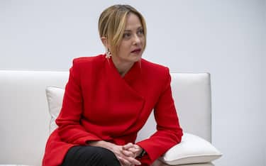 epa12870795 A handout photo made available by the UAE Presidential Court shows Italian Prime Minister Giorgia Meloni sit for a meeting with UAE President Sheikh Mohamed bin Zayed Al Nahyan (not pictured) in Abu Dhabi, United Arab Emirates, 05 April 2026.  EPA/Hamad Al Kaabi / UAE Presidential Court HANDOUT  HANDOUT EDITORIAL USE ONLY/NO SALES