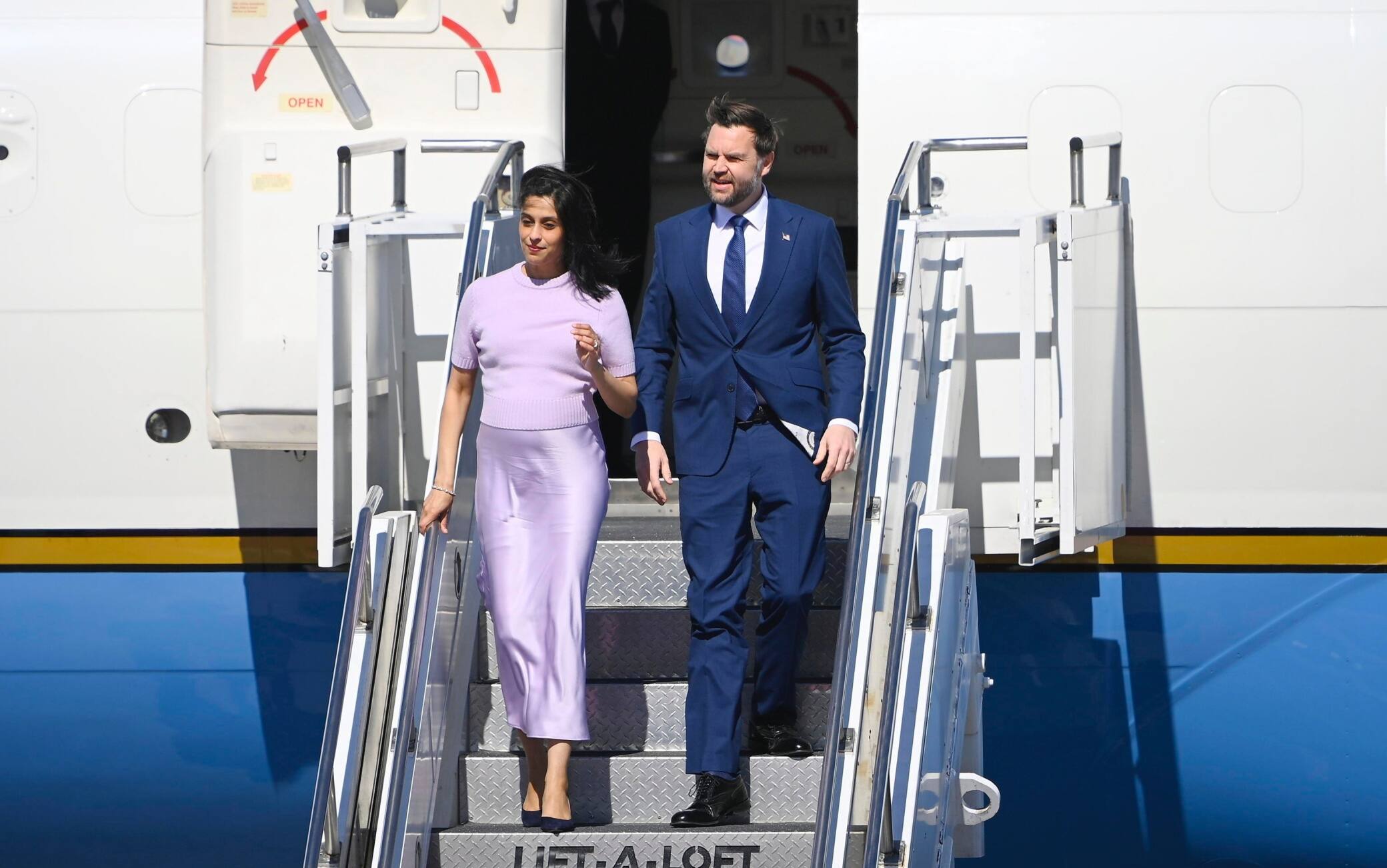 epa12872934 U.S. Vice President JD Vance (R) and Second Lady Usha Vance (L) leave Air Force Two upon their arrival at Liszt Ferenc International Airport in Budapest, Hungary, 07 April 2026. Vance is on a two-day visit to Hungary.  EPA/Zsolt Szigetvary HUNGARY OUT