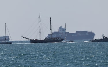 epa12423275 A vessel of the Global Sumud Flotilla arriving at Ashdod port 02 October 2025 after being  intercepted whilst carrying aid to Gaza. Israel's Foreign Ministry announced that several vessels that form part of the Global Sumud Flotilla (GSF) had been stopped and that those aboard were being transferred to an Israeli port.  EPA/ATEF SAFADI