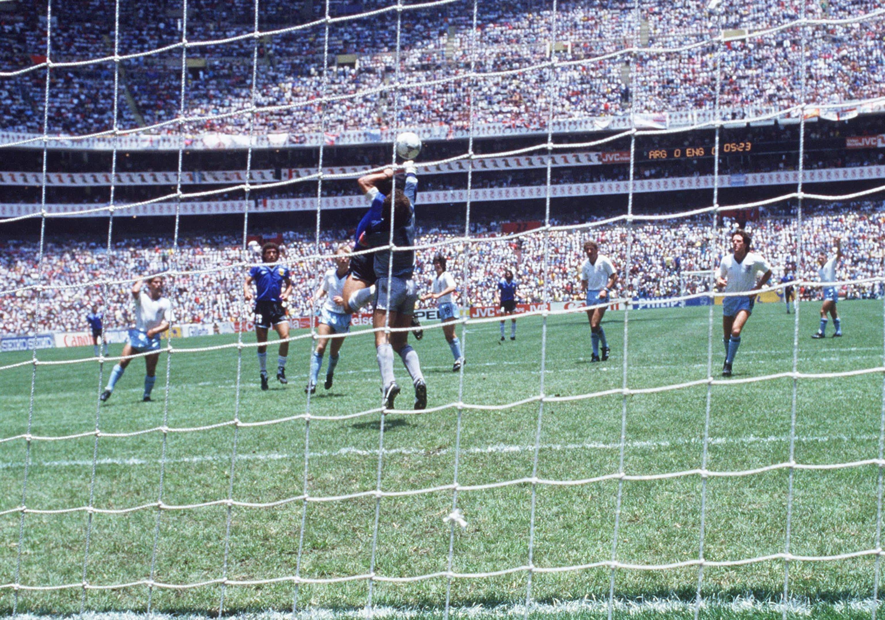 Diego Maradona, Argentina, in a pics of 23 July 1986 scoring the legendary "Hand of God" goal during the England - Argentina (1:2) match at the 1990 FIFA World Cup in Mexico.  Rome, 21 June. ANSA/ EPA