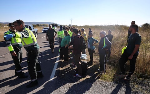 epa13336233 Rescue team and Civil Guards members arrive at the scene where two high-speed trains (AVE in Spanish symbols), one of Renfe and another of Iryo, that have crashed in the village of Urda, Toledo, Spain, 28 October 2026. At least ten people have been killed, Spanish media reported.  EPA/ISMAEL HERRERO