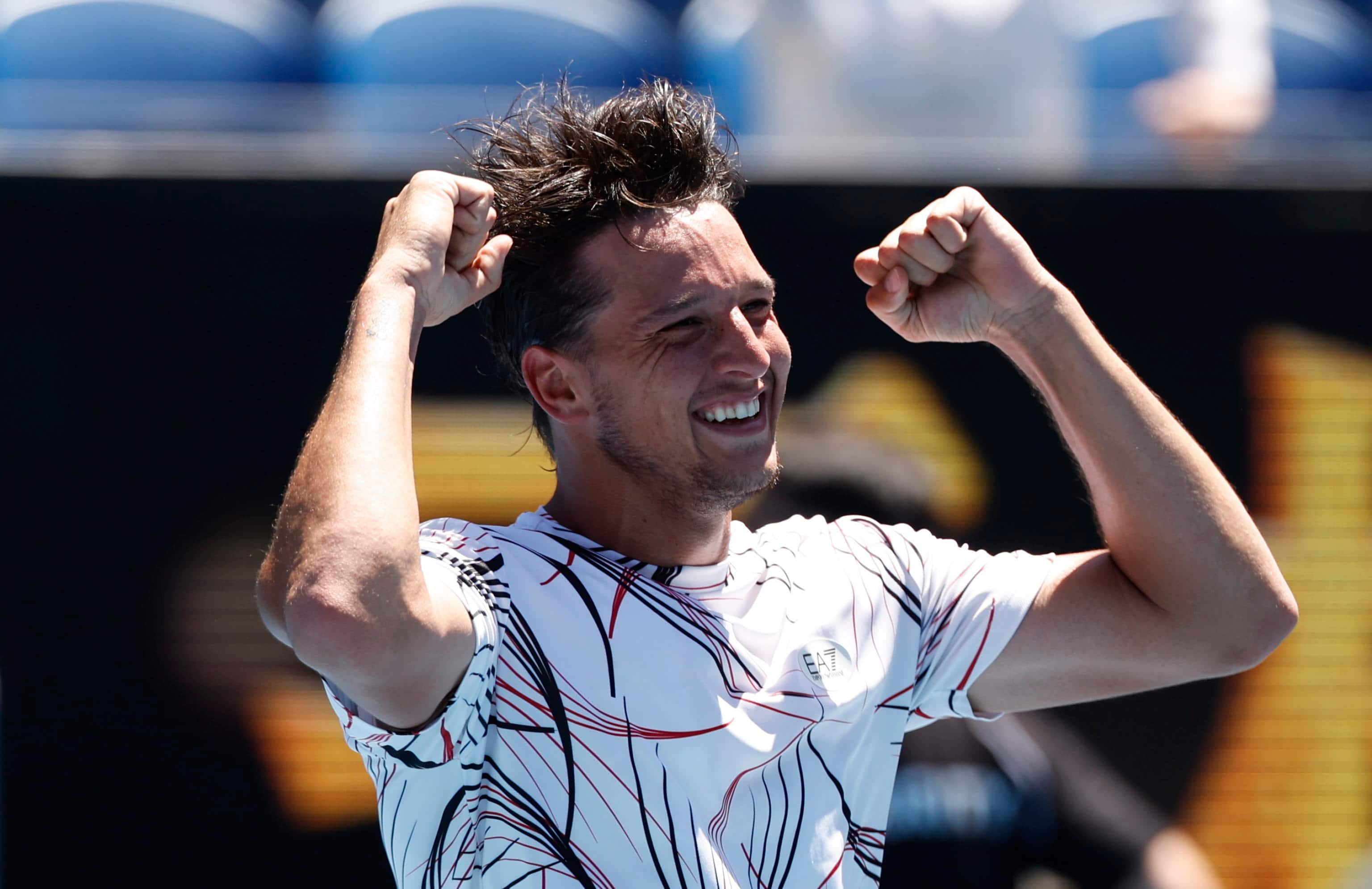 epa12676344 Luciano Darderi of Italy celebrates winning the Men's 3rd round match against  Karen Khachanov of Russia on day 7 of the 2026 Australian Open tennis tournament at Melbourne Park in Melbourne, Australia, 24 January 2026.  EPA/ROB PREZIOSO AUSTRALIA AND NEW ZEALAND OUT