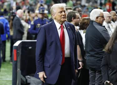 epa11885234 US President Donald Trump on the field before Super Bowl LIX between the Kansas City Chiefs and the Philadelphia Eagles at Caesars Superdome in New Orleans, Louisiana, USA, 09 February 2025. The Super Bowl is the annual championship game of the NFL between the AFC Champion and the NFC Champion and has been held every year since 1967.  EPA/ERIK S. LESSER