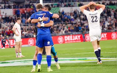 Italy s Leonardo Marin (L) celebrates with teammate Italy s Lorenzo Pani after scoring  during the Six Nations rugby match between Italy and England at the Olimpico stadium in Rome, Italy, 7 March 2026. ANSA/FABIO FRUSTACI
