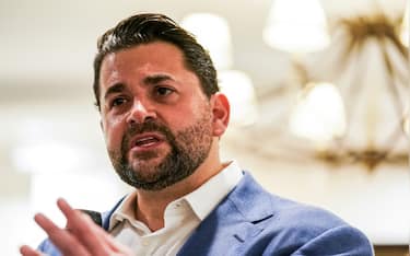 WASHINGTON, DC - JANUARY 29: 
Trump-supporting author Nick Adams addresses a crowd at his book event for the DC Young Republicans at the Capitol Hill Club on January 29, 2024, in Washington, DC.  His book is called "Alpha Kings" and he prides himself as being endorsed by Trump.  
(Photo by Jahi Chikwendiu/The Washington Post via Getty Images)