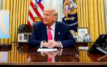 epa11945355 US President Donald Trump looks on prior to signing an executive order in the Oval Office of the White House in Washington, DC, US, 06 March 2025.  EPA/AL DRAGO / POOL