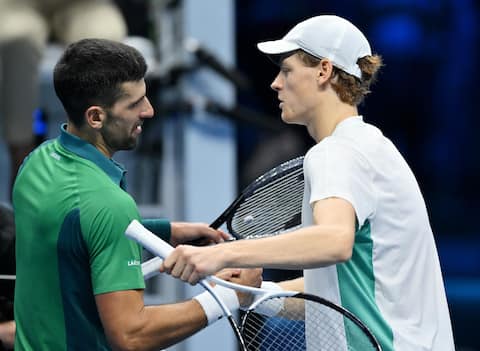Jannik Sinner of Italy embraces Novak Djokovic of Serbia during the Nitto ATP Finals 2023 tennis tournament at the Pala Alpitour arena in Turin, Italy, 14 November 2023. ANSA/ALESSANDRO DI MARCO