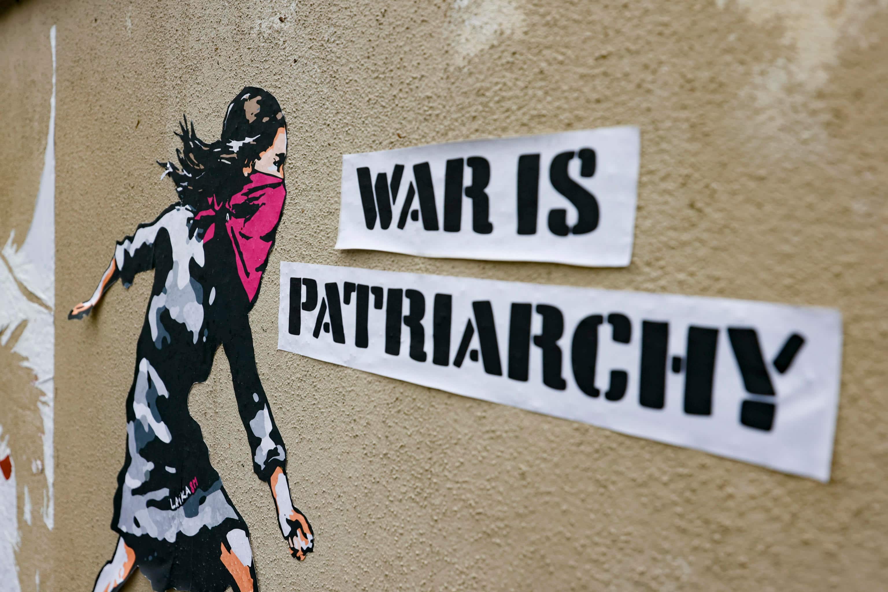 A new work by street the street artist Laika, entitled  War Is Patriarchy , appeared in Rome on the eve of the International Women's Day. The poster depicts a trans-feminist militant breaking a missile in two with a kick, Rome, March 7, 2026. ANSA/FABIO FRUSTACI