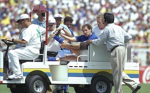 17 Jul 1994:  Franco Baresi of Italy is driven off the pitch after being injured during the World Cup final against Brazil at the Pasadena Rose Bowl in Los Angeles, California, USA. Brazil won the match 3-2 on penalties. \ Mandatory Credit: Shaun  Botterill/Allsport