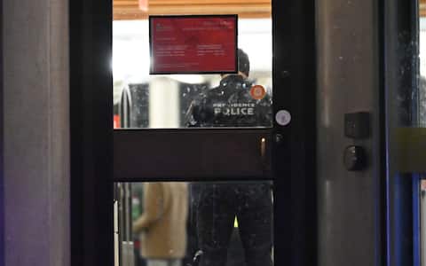 PROVIDENCE, RHODE ISLAND  DECEMBER 13: Emergency responders work at the scene near Brown University in Providence, Rhode Island, on December 13, 2025, following a mass shooting that left at least two people dead and eight others injured. Authorities said police launched a search for the suspect, who remained at large, while campus officials urged students and staff to shelter in place as the investigation continued. (Photo by Kyle Mazza/Anadolu via Getty Images)
