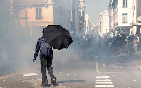 IPA89362861 - Lyon, France — October 6, 2026. High-school students take part in a protest in the area of Mazenod street in Lyon as part of a nationwide mobilization by students. Tear gas is visible during clashes between protesters and police amid heightened tensions surrounding the demonstrations.//NEIRDAPROD_sipa.2935/Credit:PITTORE/NEIRDAPROD/SIPA/2610061402