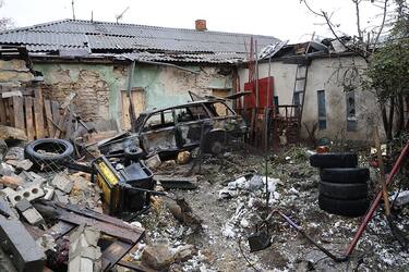 KHERSON, UKRAINE - OCTOBER 28: Wreckage of car lies at residential district after Russian shelling on October 28, 2025 in Kherson, Ukraine. Houses and cars were damaged in the city center of Kherson as a result of Russian shelling this morning. According to the City Military Administration, Russian army began shelling the city at around 04:30 am. (Photo by Olexandr Kornyakov/Suspilne Ukraine/JSC "UA:PBC"/Global Images Ukraine via Getty Images)