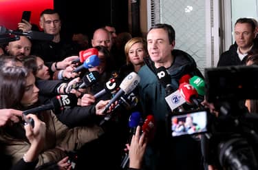 epa11885264 Incumbent Prime Minister and leader of 'Vetevendosje' party, Albin Kurti (C) addresses the media after winning the parliamentary elections in Pristina, Kosovo, 09 February 2025. The Republic of Kosovo held the parliamentary elections with Kurti's party leading with 42 percent of the vote, a drop from the 50 percent Kurti received in 2021.  EPA/GEORGI LICOVSKI
